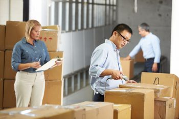 Employees Manually Tracking Inventory Together