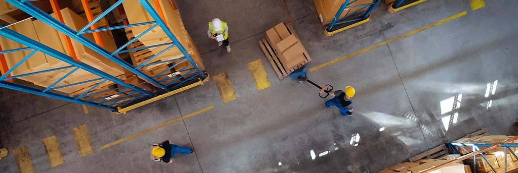 Image of aerial shot of pick and pack warehouse layout with workers