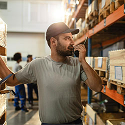 Person in warehouse that utilizes an inventory control system