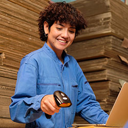 Person scanning barcodes in warehouse with full inventory management control