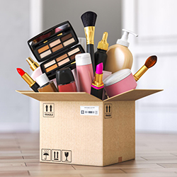 Shipping box full of cosmetics represents streamlined order fulfillment with cosmetics supply chain management