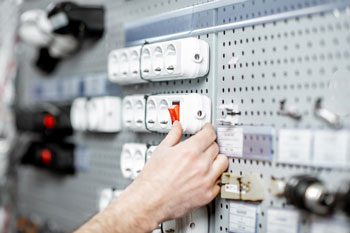 Electrical sockets in electrical goods store supplied by distributors, who use an ERP system for electrical distributors