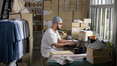 eCommerce business owner working with an apparel wholesale system