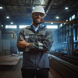 Steel worker in factory