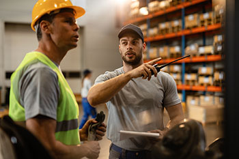 People in warehouse handling order fulfillment